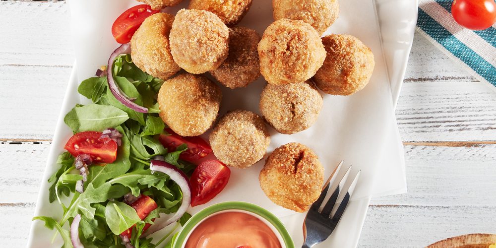 Fried meatballs with tomato mayonnaise and summer salad