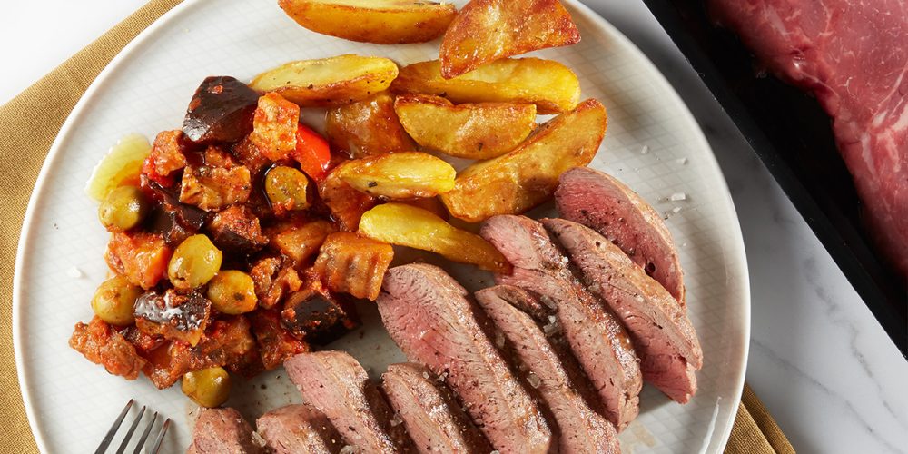 Sliced beef and traditional side dish