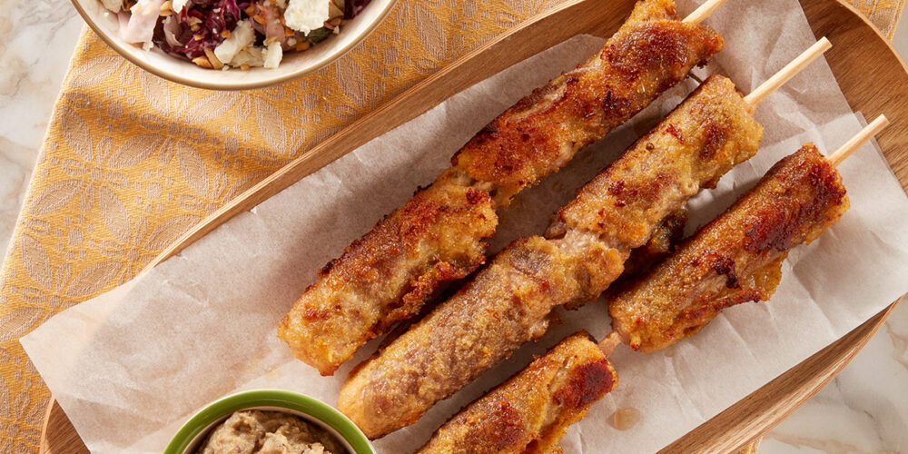 Baked bombette with barley, feta and onion salad